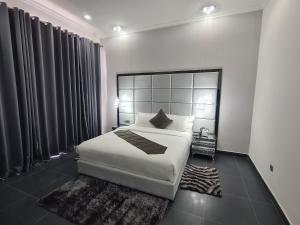 Postel nebo postele na pokoji v ubytování Indico Executivo Hotel