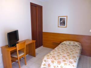 Posteľ alebo postele v izbe v ubytovaní Hotel Tamasite