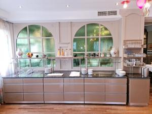 Kuchyň nebo kuchyňský kout v ubytování Hotel Restaurant Felix