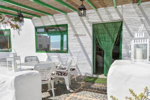 Posezení v ubytování Villa Flores