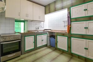Kuchyň nebo kuchyňský kout v ubytování Villa Flores + 24 fotografií