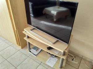 Μια τηλεόραση ή/και κέντρο ψυχαγωγίας στο Haus Opal,Wohnung 21