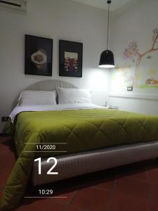 Postel nebo postele na pokoji v ubytování AliaJazz Green b&b