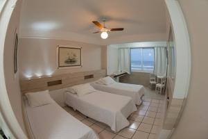 Katil atau katil-katil dalam bilik di Hotel Araçá