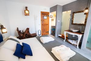 Postel nebo postele na pokoji v ubytování Hotel Puntagrande