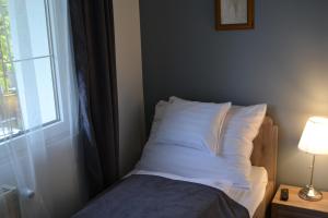 Posteľ alebo postele v izbe v ubytovaní Főnix Design Rooms