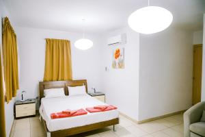 En eller flere senge i et værelse på Villa Costa Cornelia Homes + 103 billeder