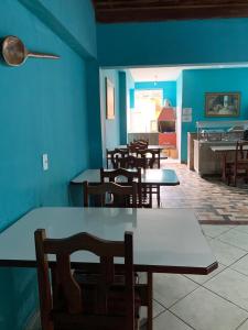 En restaurang eller annat matställe på Hotel Cidade Paisagem