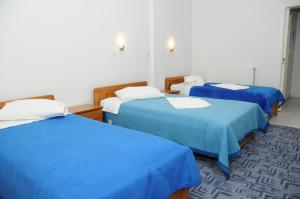Posteľ alebo postele v izbe v ubytovaní Costa-Rini Hotel
