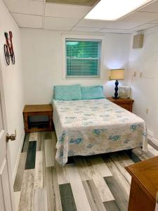 Postel nebo postele na pokoji v ubytování Tampa Lakehouse + 24 fotografií
