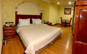 Una cama o camas en una habitación de Hotel Ruinas Resort