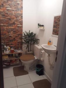 Ванная комната в Casa em Condomínio