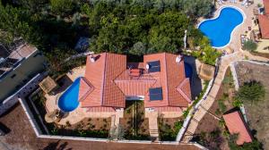 an aerial view of a house with a swimming pool at Room in BB - Authentic Boutique Hotel in Fethiye