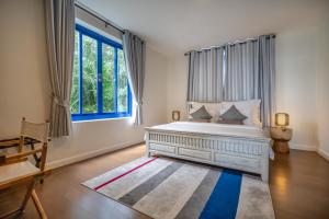Voodi või voodid majutusasutuse Aleenta Hua Hin - Pranburi - The Small Luxury Hotels of the World toas