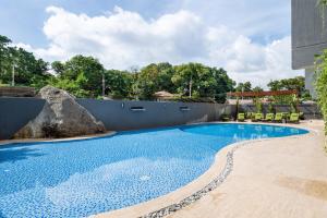 Bazén v ubytování Calypso Garden by Villacarte nebo v jeho okolí + 2 fotografie