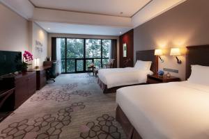 Voodi või voodid majutusasutuse Jin Jiang International Hotel Xi'an toas