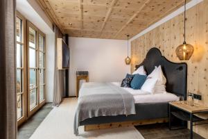 Posteľ alebo postele v izbe v ubytovaní GipfelKreuzLiebe Senhoog Luxury Holiday Homes