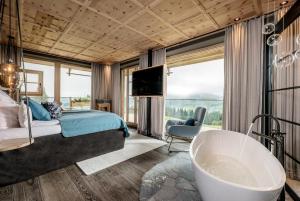 Posteľ alebo postele v izbe v ubytovaní GipfelKreuzLiebe Senhoog Luxury Holiday Homes