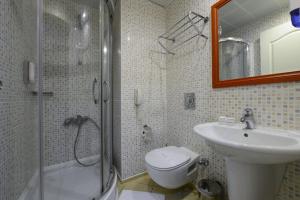 Ванна кімната в Grand Yazici Club Turban Termal