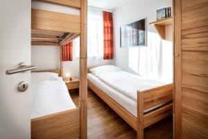 Posteľ alebo postele v izbe v ubytovaní Fewo-Obertauern Alps