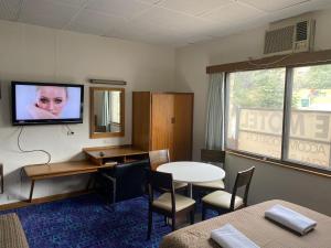 A television and/or entertainment centre at Tollgate Motel