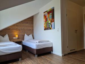 Letto o letti in una camera di Hotel Winterberg Resort
