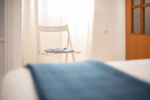 Letto o letti in una camera di BOHEMIA SANLUCAR