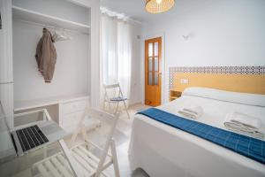 Letto o letti in una camera di BOHEMIA SANLUCAR