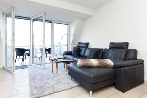 Ein Sitzbereich in der Unterkunft Meerblick-Ferienwohnung Black Pearl