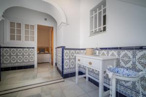 Letto o letti in una camera di BOHEMIA SANLUCAR