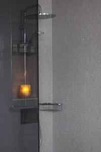 
a light is on in the corner of a bathroom at Best Western Hotel Hebron in Copenhagen
