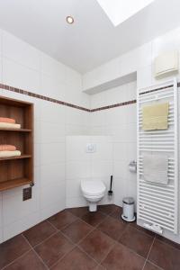 Ein Badezimmer in der Unterkunft Meerblick-Ferienwohnung Black Pearl