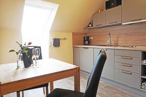 Kuchyň nebo kuchyňský kout v ubytování Ferienwohnung An der Dorfmauer