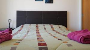 Кровать или кровати в номере Parana