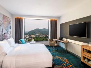 โทรทัศน์และ/หรือระบบความบันเทิงของ Novotel Marina Sriracha