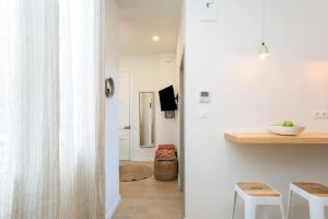 Telewizja i/lub zestaw kina domowego w obiekcie Canela Homes BARCELONA MARINA