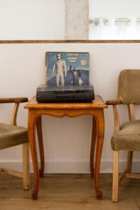 a table with a laptop on top of it at Txoko in Pamplona