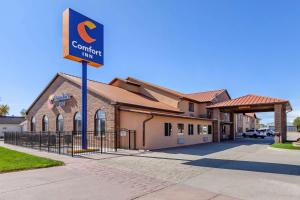 a sign in front of a building at Comfort Inn in Valentine