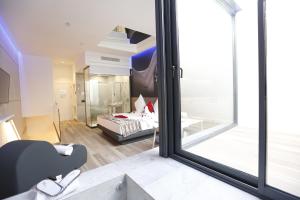 Postel nebo postele na pokoji v ubytování Hotel Loob Valencia