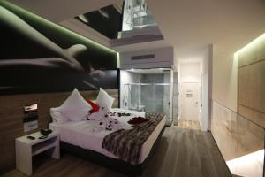 Postel nebo postele na pokoji v ubytování Hotel Loob Valencia