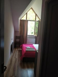 Postel nebo postele na pokoji v ubytování Favourite