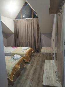 Postel nebo postele na pokoji v ubytování Favourite
