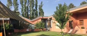 a house with a green yard in front of it at Gaia B&B in Castrovillari +11 photos