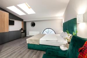 Ліжко або ліжка в номері AUSTRIAN APART HOTEL