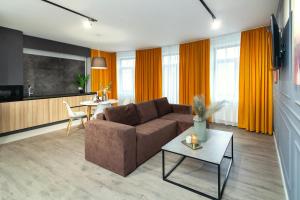 Posezení v ubytování AUSTRIAN APART HOTEL
