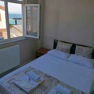 Postel nebo postele na pokoji v ubytování Hotel Mudanya