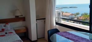 Postel nebo postele na pokoji v ubytování Hotel Ricadi + 37 fotografií