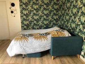 מיטה או מיטות בחדר ב-Le Banc Bourguignon