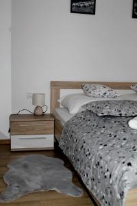 Posteľ alebo postele v izbe v ubytovaní Apartament Perełka Przy Krupówkach