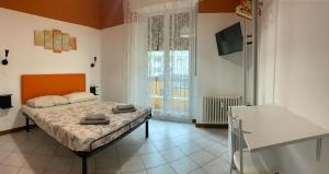 Posteľ alebo postele v izbe v ubytovaní marconi 22 rooms